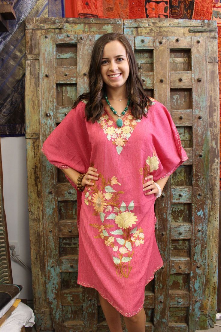 This Women's Short Caftan Dress is perfect for summer days. Featuring an eye-catching Yellow Embroidered design, it is made with light-weight fabric that offers comfortable breathability and is available in One Size fits L-3XL. Ideal for multiple occasions, this Kimono Dress is a must-have for your wardrobe. This Short Caftan Dress offers a stylish and comfortable way to relax in. The lightweight cotton blend fabric and relaxed fit provide a flattering and versatile silhouette, perfect for weari Summer V-neck Tunic With Chikankari Embroidery, Pink Embroidered Short Sleeve Summer Dress, Pink Embroidered Summer Dress With Short Sleeves, Floral Embroidered V-neck Dress For Beach, Casual Embroidered Kaftan For Summer, Floral Embroidered V-neck Festival Dress, Traditional Embroidered Summer Dress, Spring Beach Tunic With Chikankari Embroidery, Spring Vacation Tunic With Chikankari Embroidery