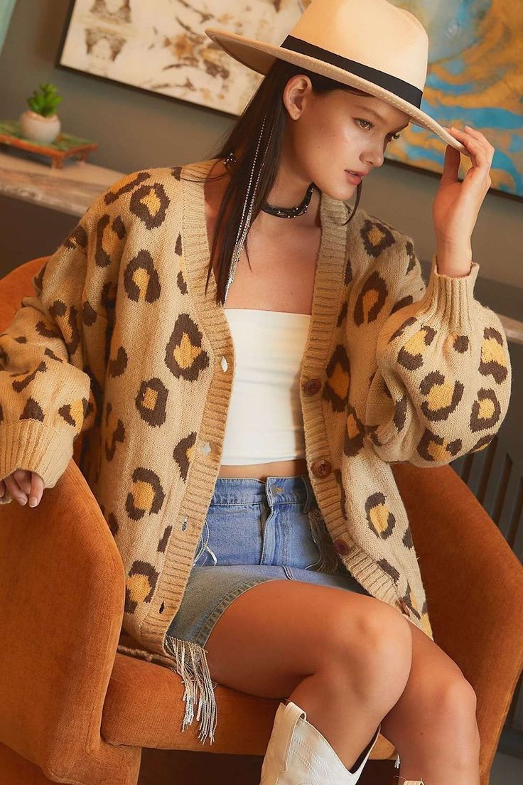 Unleash your wild side with our Leopard Print Oversize Cardigan. Made from soft and comfortable material, this cardigan features a trendy leopard print to spice up any outfit. Feel fierce and confident while staying cozy and stylish. Perfect for any season, this cardigan will make a statement wherever you go. This cardigan runs oversized, if you do not enjoy that style please size down once in this cardigan. The cardigan is very soft and cozy! our leopard cardigan does not feature side pockets b Oversized Leopard Print Long Sleeve Outerwear, Trendy Leopard Print Winter Sweater, Trendy Leopard Print Outerwear For Fall, Cozy Long Sleeve Outerwear In Leopard Print, Cozy Long Sleeve Leopard Print Outerwear, Trendy Leopard Print Long Sleeve Outerwear, Trendy Long Sleeve Leopard Print Outerwear, Leopard Print Long Sleeve Cardigan For Fall, Long Sleeve Leopard Print Cardigan For Fall