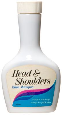 a bottle of head and shoulders lotion on a white background