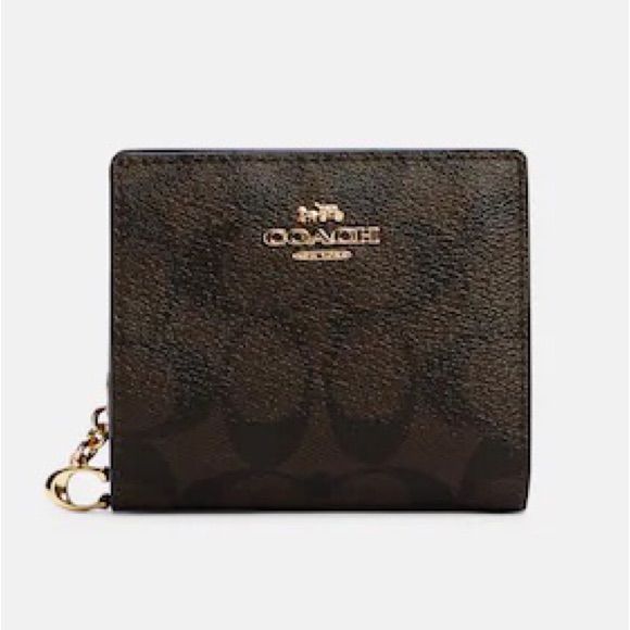 Coach Snap Wallet In Signature Canvas Brown Black 100% Authentic,Money Back Guaranteed Signature Coated Canvas And Smooth Leather Three Credit Card Slots Id Window Full-Length Bill Compartment Snap Closure Outside Zip Coin Pocket 4 1/4" (W) X 3 1/2" (H) X 1" (D) 10.5cm (W) X 9.5cm (H) X 2.5cm (D) Elegant Brown Wallet With Coin Pocket, Brown Coach Wallet With Interior Key Chain Holder, Chic Brown Coin Purse With Card Slots, Brown Rectangular Coach Coin Purse, Coach Rectangular Brown Coin Purse, Luxury Brown Coin Purse With Coin Pocket, Elegant Brown Coach Coin Purse, Chic Brown Wallet With Interior Card Slots, Compact Brown Leather Bag