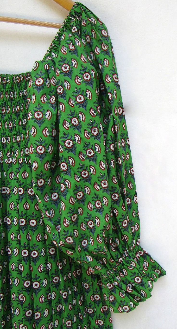 "ITEM DESCRIPTION nature green flower printed summer beach tiered maxi dress - square neckline with smocking long maxi dress - long ruffle sleeve maxi dress Features : sleeve less, square neck, Long strap dress Material : Cotton cambric Fabric: 100% cotton soft light weight ethnic print fabrics For more sizes & their measurement, please refer our below chart to understand the sizes variations available with us For your size requirement, please mention your size in seller note at the time of Green Bohemian Dress With Smocked Back, Green Ruched Long Sleeve Maxi Dress, Green Long Sleeve Ruched Maxi Dress, Green Smocked Back Maxi Dress For Summer, Green Bohemian Maxi Dress With Smocked Back, Green Bohemian Maxi Dress With Smocked Bodice, Green Bohemian Dress With Smocked Bodice, Bohemian Green Maxi Dress With Smocked Back, Green Maxi Dress With Smocked Back For Summer