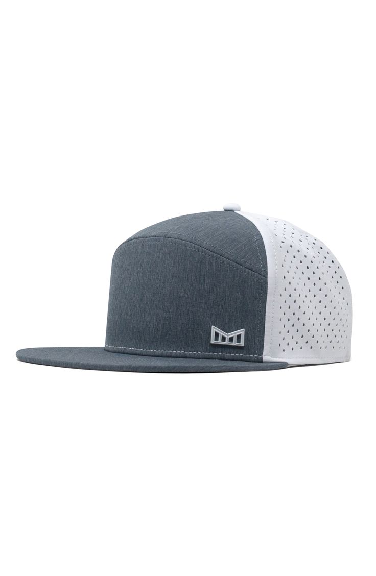 the hat is grey and white with dots on it