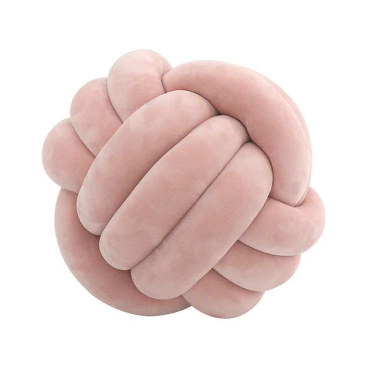 a large pink knot on top of a white background