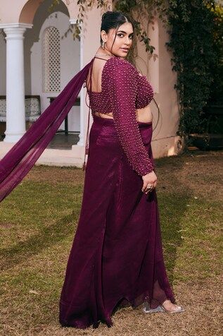 Plum pre-draped saree in crinkled chiffon base. Paired with a padded bead embellished blouse. - Aza Fashions Chiffon Blouse With Traditional Drape For Wedding, Traditional Drape Chiffon Blouse For Wedding, Party Dress With Unstitched Chiffon Blouse, Fitted Chiffon Pre-draped Saree For Wedding, Evening Chiffon Blouse With Traditional Drape, Draped Chiffon Dresses For Receptions, Fitted Chiffon Blouse For Reception, Long Sleeve Embellished Pre-draped Saree For Party, Party Pre-draped Saree Embellished With Long Sleeve Blouse