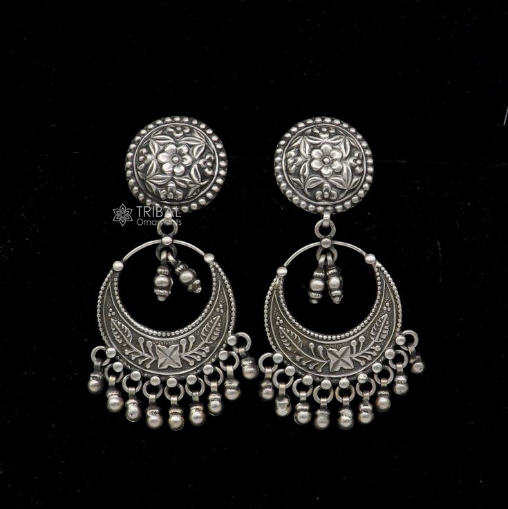 925 sterling silver handmade gorgeous stud earrings drop dangle vintage antique design earrings belly dance tribal jewelry from Rajasthan India. Metal-925 sterling silver. Type-drop dangler earrings. Length-8 centimetre approx. Width-3.5 centimetres approx. Weight-37.030 grams. Marking-925 closure-push back. Makes excellent gifting and collectible pieces. Handmade Silver Temple Jewelry Chandelier Earrings, Ornate Metal Chandbali Jewelry, Traditional Sterling Silver Chandelier Earrings With Intricate Design, Metal Earrings With Intricate Design For Diwali, Intricate Metal Chandbalis Drop Earrings, Intricate Metal Earrings For Diwali, Intricate Design Metal Chandbalis Drop Earrings, Metal Chandbalis With Intricate Design, Festival Silver Hoop Earrings With Intricate Design