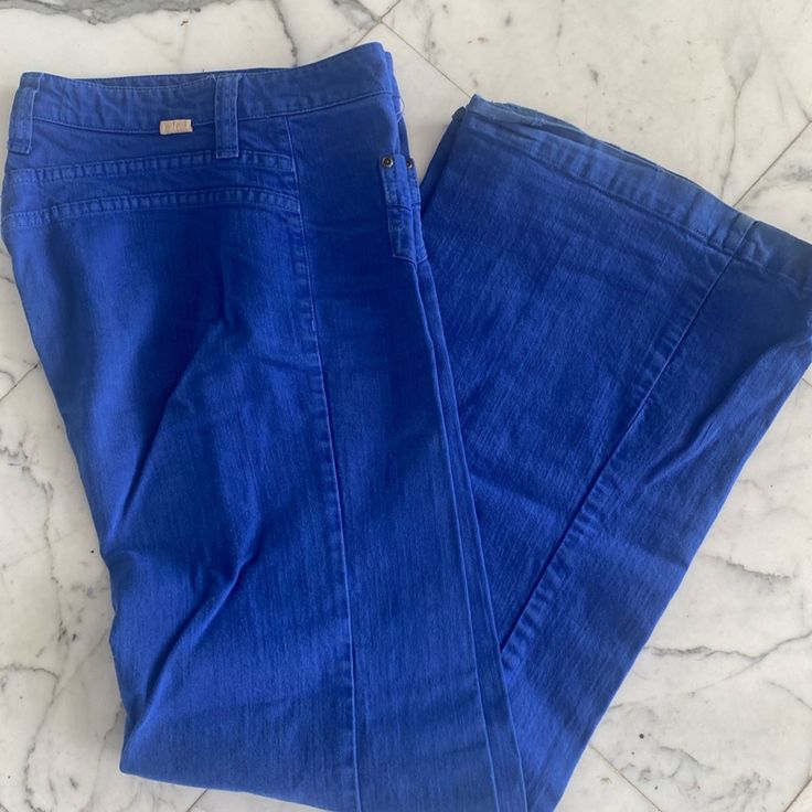 Vintage Dittos Blue Denim Mid Cut Pants. Wide Legs Iconic 70s Dittos Look. Size 29 Length 43 Inseam 33 Blue Flare Jeans With Five Pockets, Mid-rise Blue Fitted Flare Jeans, Mid-rise Blue Flare Jeans, Blue Mid-rise Flare Jeans, Blue Mid-rise Flare Jeans For Summer, 70s Inspired Wide Leg Jeans For Spring, 70s Inspired Fitted Flare Jeans For Spring, Chic Washed Blue Cotton Flare Jeans, Blue Stretch Cropped Leg Flare Jeans