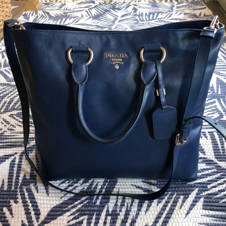 17"L X 6"W X 13"H Bn2865 High-end Blue Tote Bag, High-end Blue Bag With Detachable Handle, High-end Blue Bag With Double Handle, High-end Blue Bags For Shopping, High-end Blue Satchel Shoulder Bag, High-end Blue Shoulder Bag Satchel, Luxury Blue Bags With Gold-tone Hardware, High-end Blue Shoulder Satchel, High-end Blue Shoulder Bag With Removable Pouch