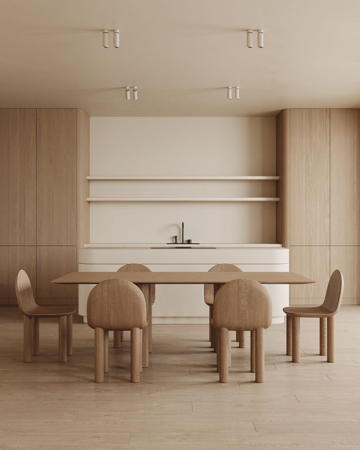 an empty dining room with wooden chairs and a table