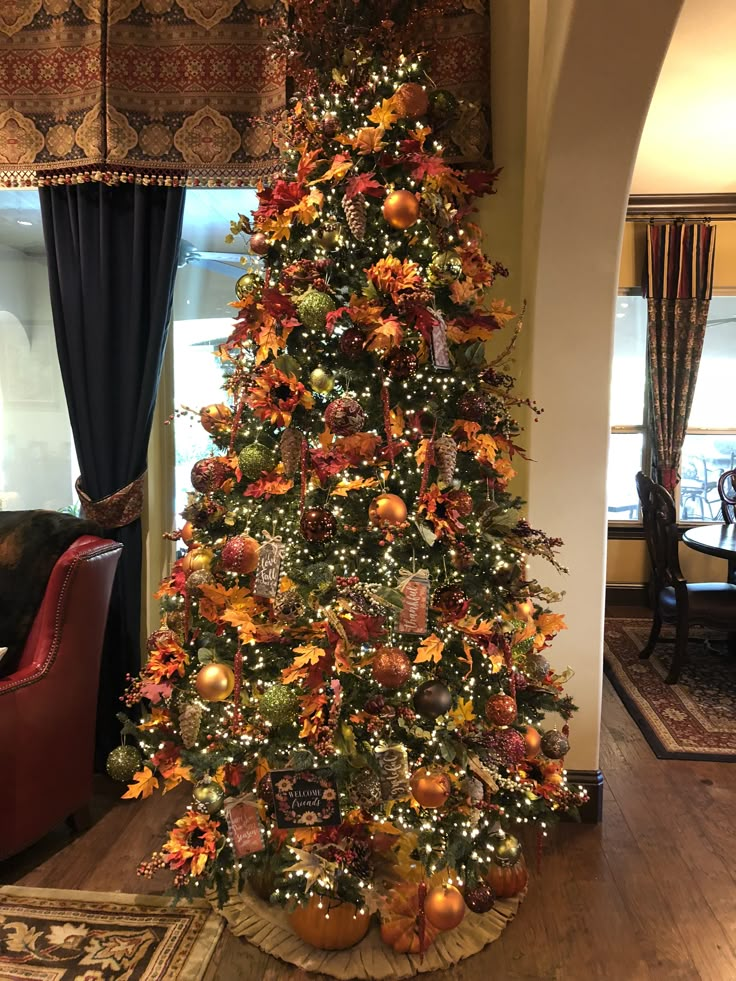 a decorated christmas tree in a living room