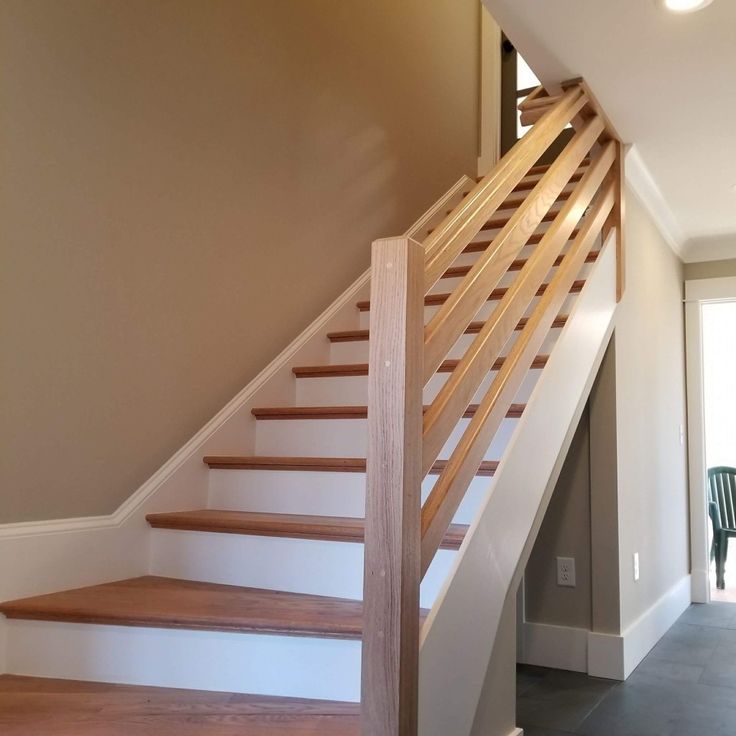 there is a wooden stair case in this house