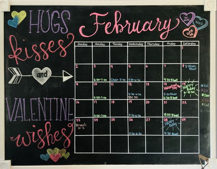 a chalk board with writing on it that says hugs, kisses, february and valentine wishes