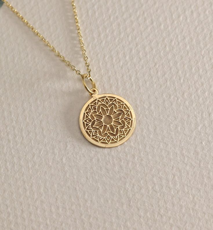 14K Real Solid Gold Mandala gold necklace ● Material of pendant: Solid Gold 14k ( REAL GOLD ) ● Metal Stamp: 14L ( REAL GOLD ) ● The pendant is available in 6 sizes: - 14,0 mm / 0,55 inches ( Diameter ) In the photos - 15,3 mm / 0.60 inches ( Diameter ) - 16,5 mm / 0,65 inches ( Diameter ) - 19,1 mm / 0,75 inches ( Diameter ) - 21 mm / 0,82 inches ( Diameter ) - 23 mm / 0.90 inches ( Diameter ) ( In the photos the size is 14mm / 0.55 inches Diameter ) ( Jump Ring inner diameter: 4 mm ) ● Materia Cheap Spiritual Yellow Gold Jewelry, 14k Gold Medallion Amulet Jewelry, Yellow Gold Plated Spiritual Necklace, Spiritual Yellow Gold-plated Necklaces, Spiritual Yellow Gold Plated Necklaces, Spiritual Recycled Gold Round Pendant Jewelry, 14k Gold Filled Yellow Gold Charm Necklace For Anniversary, Gold Sterling Silver Spiritual Jewelry, 14k Gold Filled Medallion Jewelry