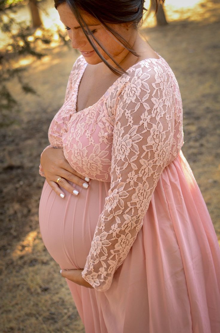 Beautiful long sleeve dress that features a lace bodice and a long flowing chiffon dress to show off the elegance of an expecting mother. This maternity dress is perfect to toss the train in the air for those exaggerated photographs. This dress is perfect for the mama look to show a little modesty during her maternity shoot. This dress is available in only one size. Material:Bodice - stretch lace Dress - chiffon Approximate measurements:Top: 14 inches Length total: 61 inches Color: Product color Long Sleeve Lace Maxi Dress With Lace Bodice, Long Sleeve Maxi Dress With Lace Bodice, Maternity Maxi Dress With Lace Sleeves, Flowy Long Sleeve Maternity Dress, Maternity Lace Maxi Dress With Lace Sleeves, Lace Maternity Dress With Lace Trim, Long Sleeve Lace Maternity Dress, Elegant Long Sleeve Flowy Maternity Dress, Maternity Lace Dress With Lace Bodice