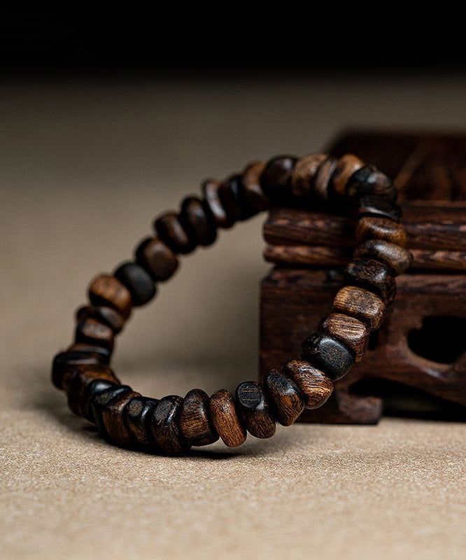 The exquisite Retro Brown Sandalwood Buddha Beads Bracelet is a true work of art, exuding an air of sophistication and exclusivity. Handcrafted with precision and attention to detail, this bracelet boasts a timeless appeal that is reminiscent of old-world luxury. The warm hues of brown sandalwood perfectly complement the intricate Buddha beads, making it a must-have accessory for the discerning fashion connoisseur. Elevate your style with this exquisite bracelet and embrace the elegance it exude Buddha Bracelet Beads, Beads Making, Buddha Beads, Daily Hairstyles, Retro Lighting, Dress Jewelry, Green Print, Beads Bracelet, Bracelet Making