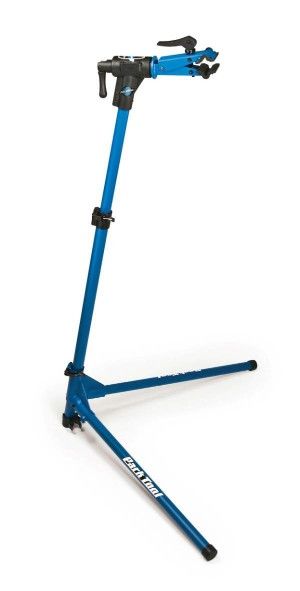 a blue bike stand with two wheels on it's legs and one leg up