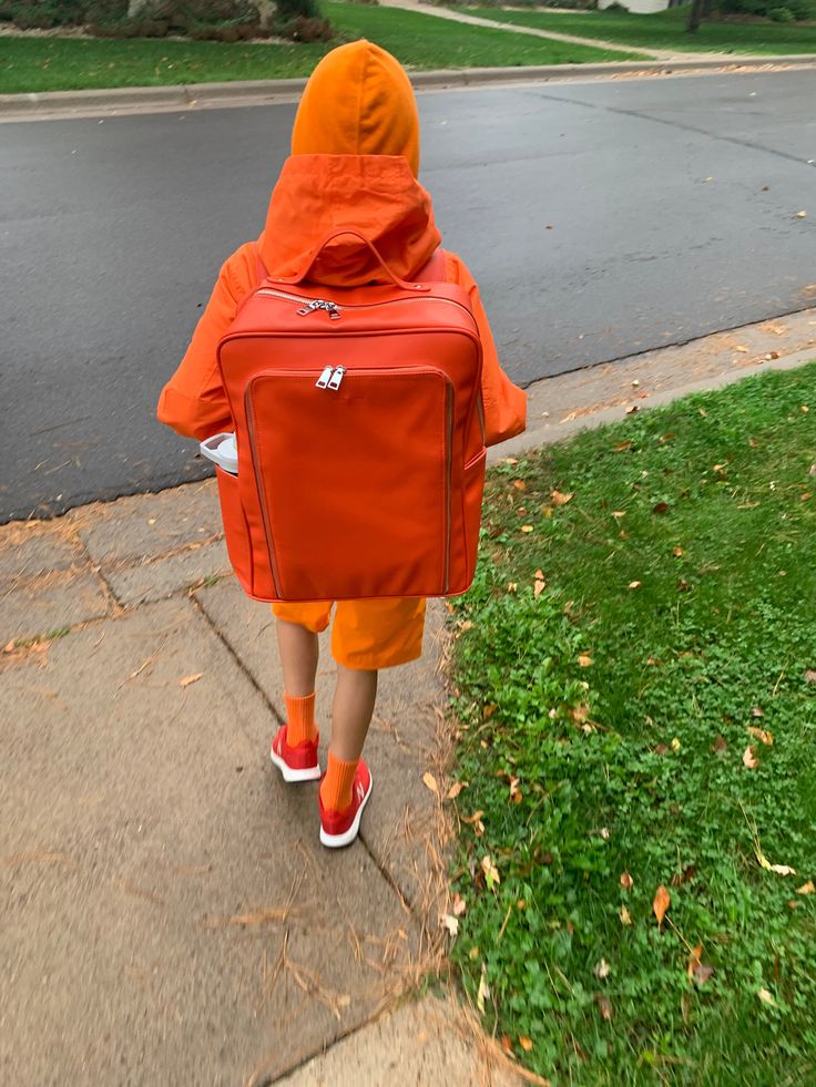 The orange backpack, my friends. It's here and it allows you to own that true orange backpack that you've been hunting! You found it! Monochrome backpacks are here to enhance your coolness (not ours!). They're for you. We're working on our own coolness...you work on yours by enjoying the vegan leather love of our orange backpack. Orange you glad? Vegan Leather. 14 x 17 x 7 Orange Backpack, Orange Socks, Purple Socks, Urban Backpack, Yellow Socks, Red Socks, Orange Backpacks, Green Socks, Everyday Backpack