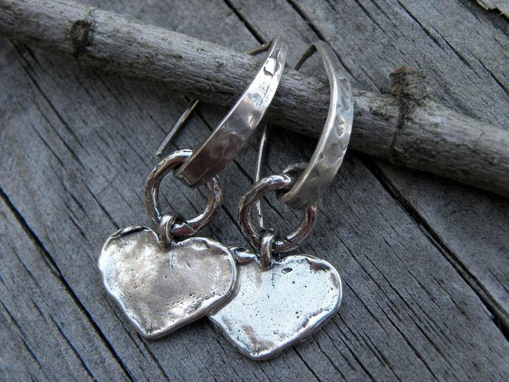 "Gorgeous solid handcrafted artisan sterling silver hearts and artisan sterling silver ear wires this one of a kind earrings are 1.5\" long. Rustic and modern they will make a statement! I have oxidized and polished the metal to a beautiful shine to bringing out all of the textures." Nickel-free Unique Heart Earrings, Unique Nickel-free Heart-shaped Earrings, Unique Heart-shaped Earrings, Unique Nickel-free Dangle Heart Earrings, Sterling Silver Double Heart Earrings With Ear Wire, Unique Handmade Dangle Heart Earrings, Hand Forged Sterling Silver Earrings For Anniversary, Unique Handmade Heart Dangle Earrings, Hand Forged Silver Heart Jewelry