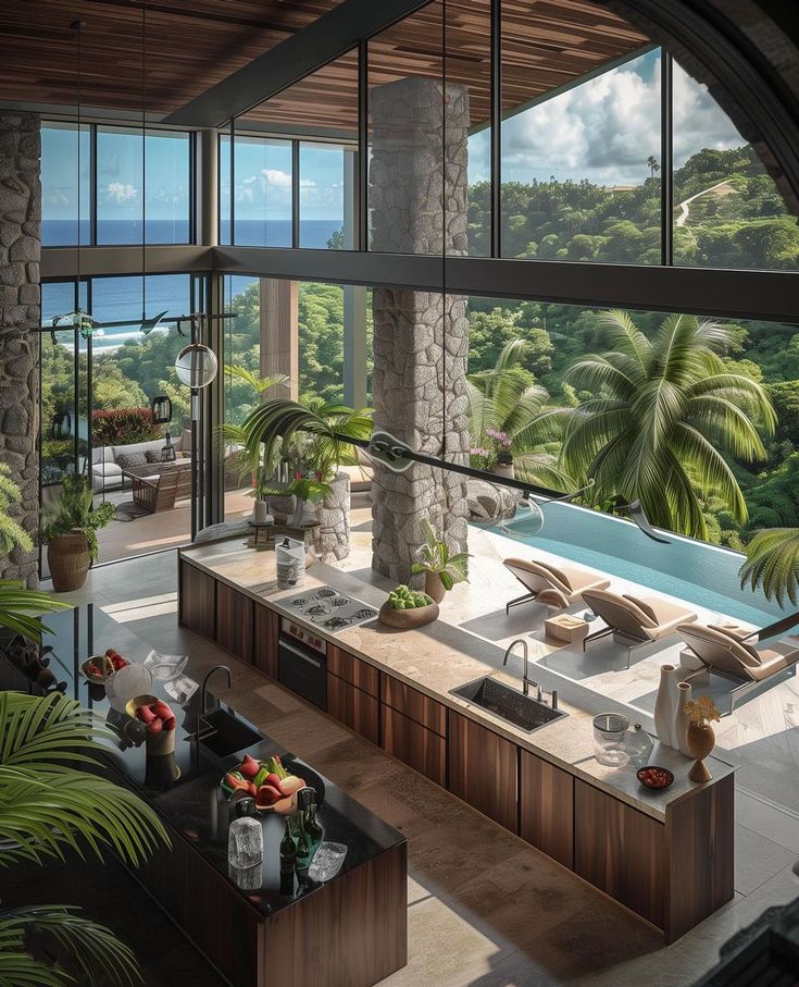 an artist's rendering of a kitchen and living room in a house overlooking the ocean