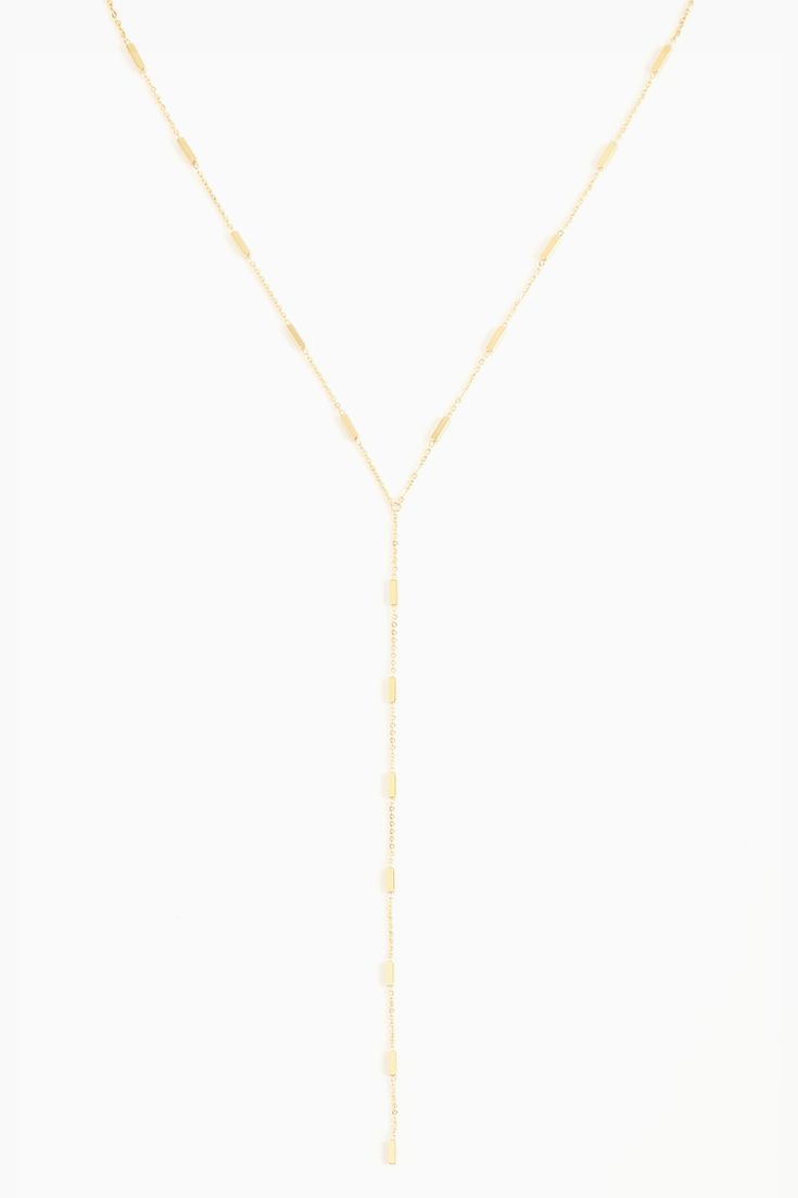 Our most coveted lariat necklace style is back and better than ever! After 5 years of perfecting our best-selling chain in stanless steel, the Regina Lariat features 16" of geometric rectangular chain link details with an 8" drop. Rock this piece as a long chain over a high neck line, or present a mock-body chain aesthetic by tucking it into a plunging neckline, our fan favorite lariat y-necklace style is fit for every ensemble. Worn separately, or layered with other chains and chokers, this pie Chain Aesthetic, Chains Aesthetic, Sparkle Shoes, Ring Bag, Fragrance Collection, Anklet Jewelry, Lariat Necklace, Long Chain, Plunging Neckline