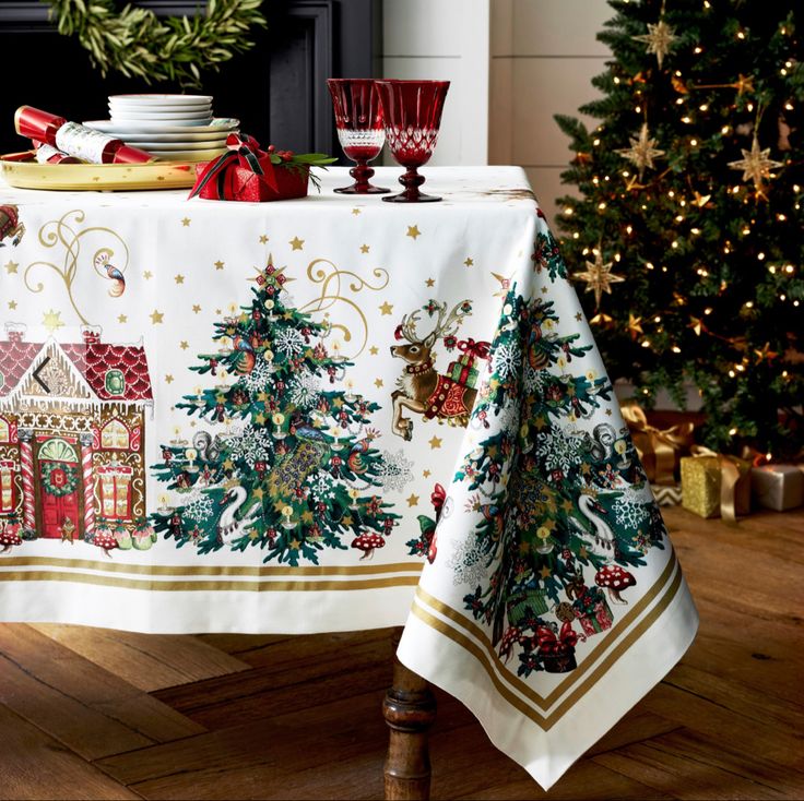 Celebrate the magic of the season with a tablecloth inspired by the legendary 19th-century American poem "A Visit from St. Nicholas." Surrounding a center of festive gold stars, the border is embellished with a vintage-style collage featuring St. Nick and his sleigh, prancing reindeer and decorated Christmas trees.

Woven of 100% cotton.
OEKO-TEX® STANDARD 100: safe from 1000+ harmful substances. 14.HUS.42449 HOHENSTEIN HTTI. Learn more about our environmental commitment.
Machine-wash. Christmas Tablecloth Ideas, Christmas Garland Ideas, Garland Ideas, Christmas Bathroom Decor, Christmas Tablecloth, Gold Christmas Decorations, Charming Christmas, White Christmas Decor, Night Before Christmas