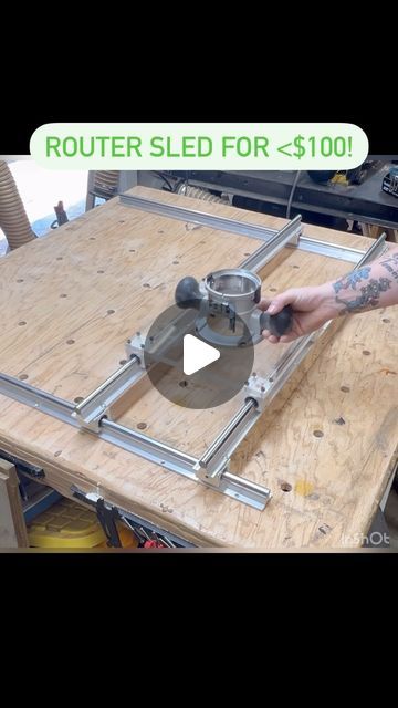 a man working on a router table with the words router sled for $ 100