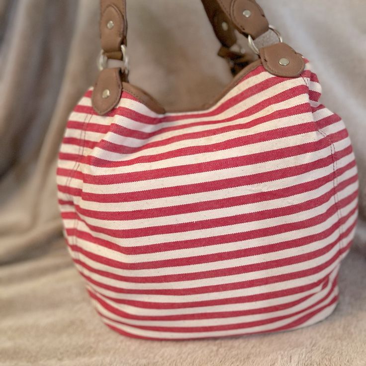 Striped Shoulder Bag Blue Lining With Red Trim Boho Style Never Used, Small Tear On Bottom Red Bucket Shoulder Bag With Adjustable Strap, Red Bucket Bag For Everyday Use, Red Bucket Shoulder Bag For Daily Use, Everyday Striped Shoulder Bag With Adjustable Strap, Everyday Striped Bag With Adjustable Strap, Striped Canvas Shoulder Bag For Daily Use, Striped Bag With Adjustable Strap For Everyday Use, Casual Red Satchel With Large Capacity, Striped Shoulder Bag For The Beach