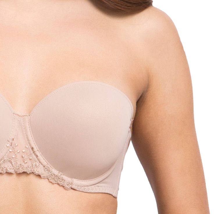 The Delice Strapless Bra will keep you self-assured all day. This strapless bra is crafted in microfibre for the smoothest silhouette – you won’t even know you’re wearing it. Structured side boning adds support and embroidered tulle detailing keeps it fresh and feminine. Style# 12X300 Style: Molded Strapless Underwired Bra Fabric: 35% Polyurethane, 31% Polyester, 25% Polyamide, 9% Elastane Design: Smooth, strapless underwired bra with molded cups. Cups are lightly padded. Silicone grips on band for no-slide fit. Embroidered tulle detailing and scalloped edges at the centre. Comes with detachable and adjustable straps. Straps can be worn over the shoulder, around the neck, or crisscrossed. Fit and Tips: Gives a beautiful and natural rounded shape. Invisible under clothes. Reassuring support Elegant Stretch Bandeau Bra, Elegant Seamless Bra With Sweetheart Neckline, Elegant Stretch Tube Top With Removable Bra Pads, Elegant Bra With Removable Straps, Elegant Underwire Tube Top, Elegant Full Coverage Bra With Removable Straps, Elegant Strapless Bra With Padded Cups, Elegant Stretch Bra Friendly Tube Top, Elegant Bandeau Bra With Removable Cups