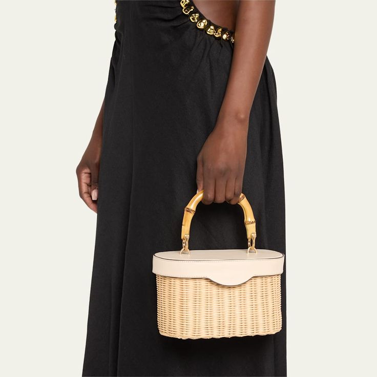 Cult Gaia "Brynn" clutch bag in allover sphere polypropylene, polyester, and leather  Fold-over flap top  Approx. 12.6"H x 17.2"W x 6.5"D Imported Evening Beige Straw Bag With Detachable Strap, Beige Straw Bag With Detachable Strap For Evening, Formal Natural Color Top Handle Bag, Modern Top Handle Straw Bag With Removable Pouch, Modern Straw Bag With Top Handle And Removable Pouch, Modern Natural Shoulder Bag For Evening, Formal Beige Bag With Bamboo Handle, Formal Bags With Removable Pouch For Summer, Formal Summer Bag With Removable Pouch