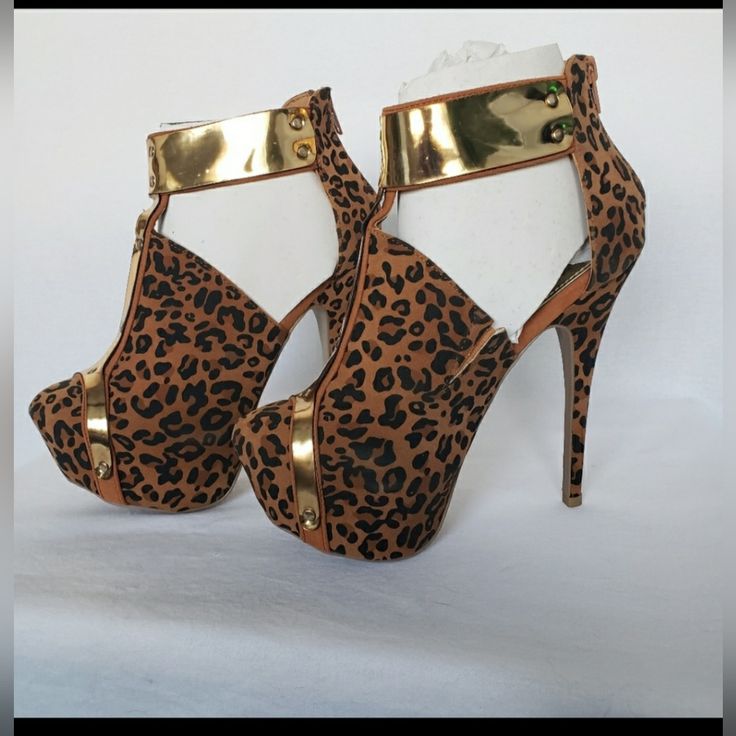 Beautiful Animal Print Platform Stilettos, Approx 6" Heel And 2"Platform, Size 6.5... Slight Flaws Around Gold Ankle Band Not Very Detectable But Worth Noting, Sky High And Super Sexy!, Chic Brown Heels For Party, Chic Brown Party Heels, Brown Sandals With 4-inch Heel For Party, Brown Heels With Heel Strap For Party, Party Brown Heels With Heel Strap, Leopard Print Sandals With Round Toe For Party, Brown Platform Heels For Night Out, Brown Platform Heels For A Night Out, Fitted Brown Heels With Ankle Strap