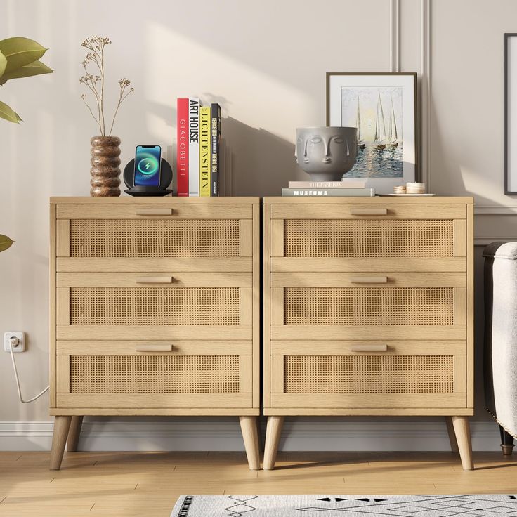 a wooden dresser sitting next to a white couch