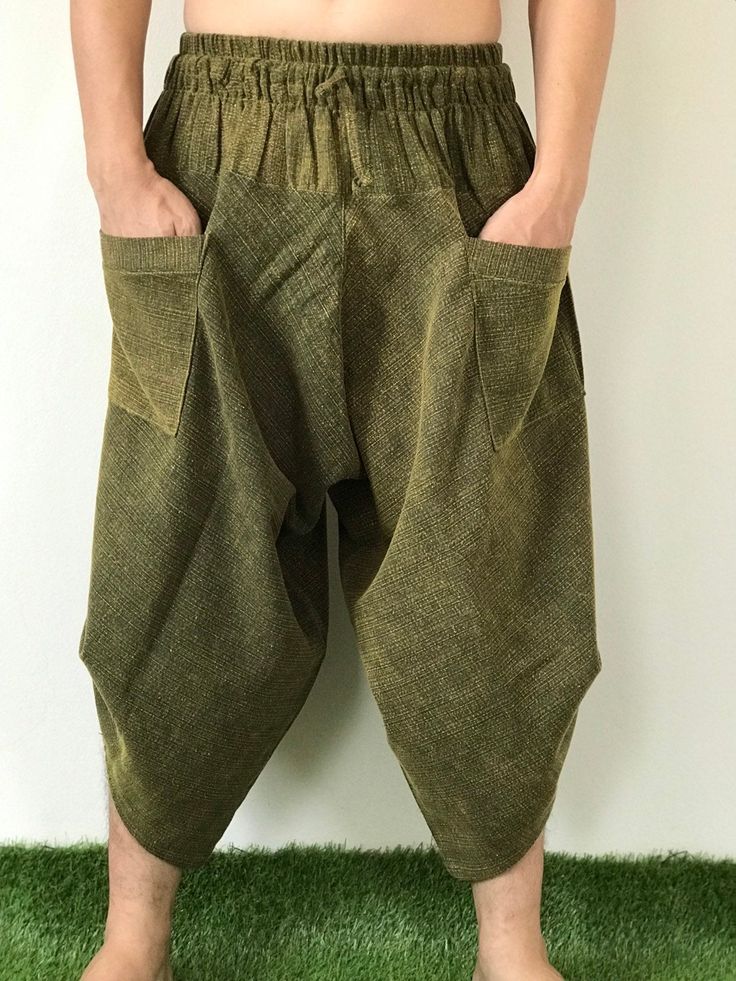 "Male Model Tall 5'9\" Waist 34\" Samurai Pants - elastic waistband, Unisex pants, beautiful casual pants is unique & comfortable to wear Handmade with a very lovely pattern, it is easy to wear and great for many occasions. One size fits most. These pants are great for many different activities like traveling, dancing, going to festivals, rock climbing, yoga, meditation, massage, working out, martial arts, Taichi MATERIAL: 100% Cotton APPROX MEASUREMENT: Waist: 24\"- 40\" Length: 27\" (Refer Casual Harem Bottoms With Pockets, Baggy Harem Cargo Pants, Casual Harem Pants, Casual Spring Harem Parachute Pants, Casual Harem Bottoms With Elastic Waistband, Casual Baggy Harem Parachute Pants, Non-stretch Harem Pants With Tapered Leg And Elastic Waistband, Baggy Harem Pants With Side Pockets For Loungewear, Baggy Khaki Pants For Loungewear