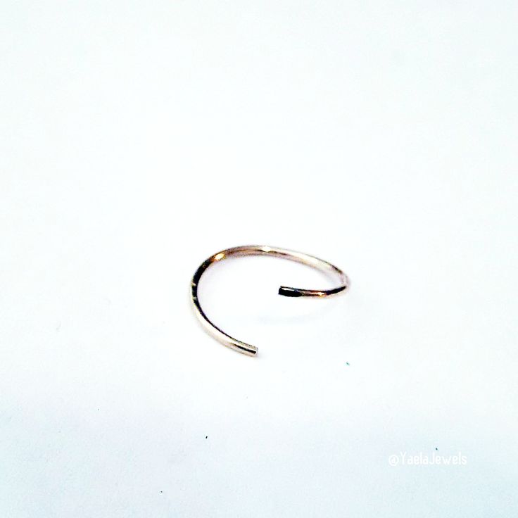 Simple and delicate belly button hoop ring. It comes in 14k goldfilled or 925 sterling silver and its nickel-free. A small opening in the hoop that you twist open to put on and close once in. ★Available Gauge: 20(0.8mm), 18 (1mm) in 8mm, 10mm or 12mm diameter. ★Note: Please Choose Accurate size for your piercing The perfect gift for you or your loved ones. 🔸🔸BELLY BUTTON ARE FINAL SALE DUE TO HYGIENIC REASONS🔸🔸 In the picture: 20g - 12mm ★Packaging All items are packed in an elegant jewelry Adjustable 14k Gold Minimalist Bypass Ring, Adjustable Tiny Rose Gold Rings, Small Hoop 14k Rose Gold Rings, 14k Rose Gold Nose Rings, Adjustable Rose Gold Sterling Silver Midi Rings, Adjustable Rose Gold Nickel-free Cartilage Earrings, Adjustable Nickel-free Rose Gold Cartilage Earrings, Adjustable Small Hoop Stackable Jewelry, Hypoallergenic Yellow Gold Midi Rings In Sterling Silver