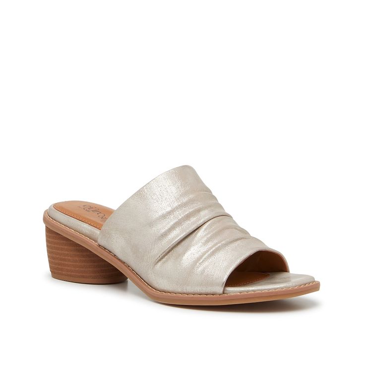 Eurosoft-Corely Sandal Bring some stylish versatility to your look with the Corely sandal from Eurosoft. This mule-inspired pair sports a ruched design for some texture, while the slight block heel gives a bit of lift. Casual Slip-on Mules With Padded Heel, Summer Slip-on Low Heel Mules, Slip-on Low Heel Mules For Summer, Spring Slide Mules With Padded Heel, Casual Slide Heels For Summer, Casual Summer Slide Heels, Summer Slip-on Sandals With Low Heel, Spring Slide Heels With Padded Heel, Casual Low Heel Mules With Removable Insole