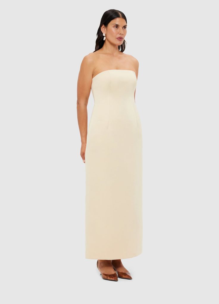 PRODUCT DESCRIPTION Premium textured maxi dressStrapless necklineInvisible side zip closureFitted waistFully lined SIZE & FIT 6 8 10 12 14 16 18 Bust 80 85 90 95 101 107 113 Waist 65 70 75 80 86 92 98 Hip 94 99 104 109 115 121 127 Back length 116 117 118 119 120 120 120 Hem Circumference 87 92 97 102 108 114 120 Amanda is 5’9" (177 cm) and wears a size 8Bust: 31” (82cm) / Waist: 24" (61cm) / Hips: 35” (89cm) Pala is 5’10” (178 cm) and wears a size 12Bust: 39” (99cm) / Waist: 31” (78cm) / Hips: 4 Formal Strapless Dress With Pleated Bodice And Straight Neckline, Strapless Dress With Pleated Bodice And Straight Neckline, Dinner Dress With Fitted Bodice And Straight Neckline, Elegant Strapless Midi Dress For Dinner, Strapless Dress With Boned Bodice For Gala, Evening Midi Dress With Boned Bodice, Evening Strapless Dress With Lined Bodice And Straight Neckline, Evening Strapless Dress With Straight Neckline And Lined Bodice, Evening Strapless Dress With Straight Neckline