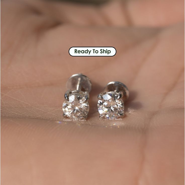 Colorless Solitaire Wedding Earrings | Crafted With 14K White Gold, These Stunning Round Cut Moissanite Stud Earrings Are Perfect For Your Special Day | Complete Your Bridal Set With These Ear Lobe Earrings Are Sure To Make A Statement On Your Special Day ✥ 𝐅𝐢𝐧𝐝 𝐭𝐡𝐞 𝐦𝐚𝐭𝐜𝐡𝐢𝐧𝐠:  Ring: https://www.etsy.com/listing/938820538 Pendant: https://www.etsy.com/listing/1474296663 ✥ 𝐌𝐚𝐢𝐧 𝐒𝐭𝐨𝐧𝐞 𝐃𝐞𝐭𝐚𝐢𝐥𝐬: ↣ Shape: Round ↣ Weight: 0.85 CTW (App.) ↣ Color/Clarity: Colorless/VVS ↣ Type: Moissanite ↣ Making Process: Handmade - Crafted by our experienced team ↣ Options: Lab Grown Diamond and Natural Diamond (Possible on request while placing an order and Extra Chargeable Service) ✥ 𝐉𝐞𝐰𝐞𝐥𝐫𝐲 𝐃𝐞𝐭𝐚𝐢𝐥𝐬: ↣ SKU: GBS0318-0320-0319 ↣ Metal Purity: 925 Sterling Silver  ↣ Met Timeless Jewelry With Matching Earrings For Anniversary, Timeless Jewelry Set With Matching Earrings For Anniversary, Timeless Sterling Silver Diamond Earrings For Wedding, Moissanite Bridal Earrings For Gift, Classic Sterling Silver Diamond Earrings As Gift, Gia Certified Sterling Silver Earrings, Gia Certified Diamond White Jewelry Gift, Silver Wedding Diamond Earrings With Lab-grown Diamonds, Classic Sterling Silver Diamond Earrings For Wedding