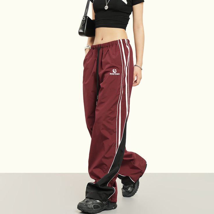 5ft 5''(166cm) tall, 97 lbs(44kg) weight and wearing a size M163cm/44kg wearing a size S - STRIPED- Nylon - Track sport style- Wide straight fit- 2 colors Sporty Full-length Cargo Pants For Outdoor Activities, Full Length Sportswear Bottoms For Training, Sporty Outdoor Cargo Pants, Athleisure Full Length Pants For Outdoor Activities, Sporty Gym Trousers, Casual Full Length Sweatpants For Training, Sporty Wide Leg Sweatpants For Outdoor, Wide Leg Sporty Sweatpants For Outdoor, Baggy Sports Pants