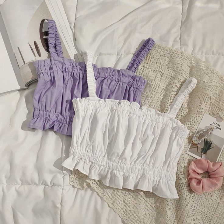 Smocked Ruffled Cropped Cami New With Tag Purple, White Casual White Tops With Ruffled Straps, White Trendy Tops With Ruffled Straps, White Trendy Top With Ruffled Straps, White Ruffled Smocked Top For Summer, White Smocked Top With Ruffled Straps For Spring, Feminine White Smocked Top With Ruffles, White Feminine Smocked Top With Ruffles, White Smocked Top With Ruffled Straps, White Sleeveless Smocked Top For Brunch