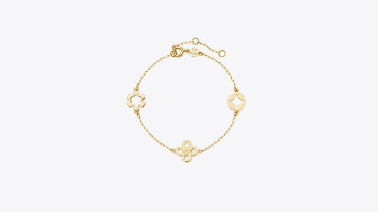 Kira Clover Bracelet: Women's Designer Bracelets | Tory Burch Elegant Good Luck Bracelet Jewelry, Elegant Good Luck Jewelry Bracelet, Clover Bracelet, Designer Bracelets, Free Bracelet, Hinged Bracelet, Luck Charms, Flower Bracelet, Stud Earrings Set