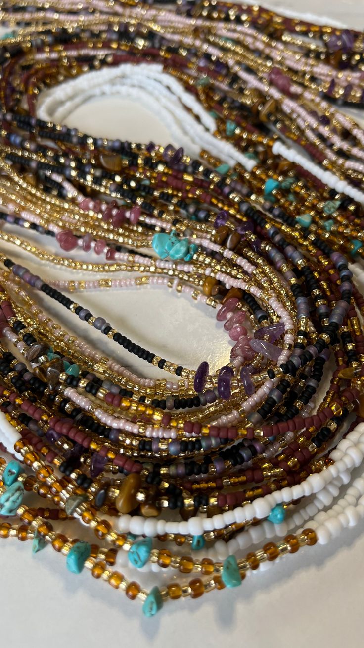 I'm pleased to offer my handmade waist beads to you at wholesale pricing. With these strands, you will be able to make at minimum 2x profit off of your initial investment( depending on your markup). All waist beads will be traditional tie-ons on a standard 50-inch string. These waist beads will be seed beads and accent beads. As well as an option for crystal waist beads. There are 3 design options to choose from 1. Intuitive design- Leave it to me and I'll intuitively create all the waist bead s Bohemian Tiny Beads Waist Beads For Festival, Bohemian Multi-strand Waist Beads For Gift, Bohemian Multi-strand Waist Beads As Gift, Bohemian Style Colorful Waist Beads For Gift, Handmade Heishi Beads Waist Beads For Beach, Handmade Bohemian Waist Beads As A Gift, Handmade Bohemian Waist Beads For Gift, Bohemian Handmade Waist Beads As A Gift, Handmade Multi-strand Waist Beads As Gift