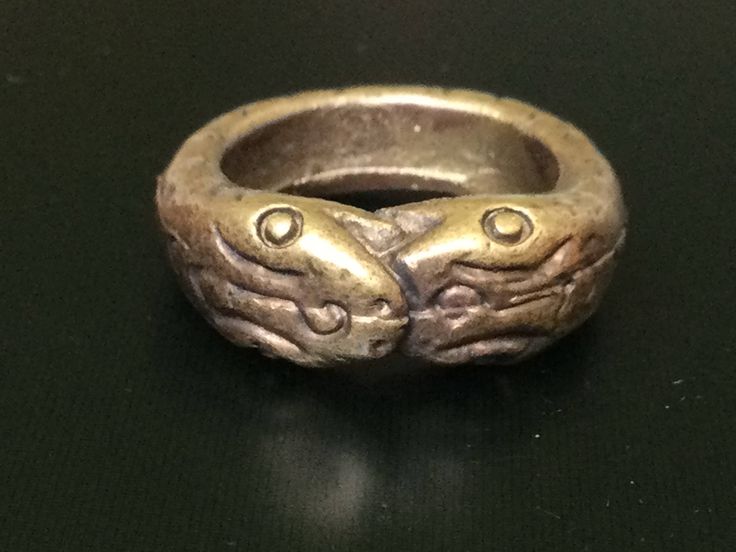 "This is a perfect and unique style magic ring made of brass metal by Lp Imm from Hua-khao temple. The power of the ring is to protect all dangers including ghost, evils and devils and the ring can bring good luck, fortune and wealth to the wearer. The ring showcases an elegant design with unique holy amulet. It is great to get this ring for your loved one or treat yourself for a classic timeless style. Amulet Name: Magic Nakabast Magic Ring Ring details: The exact benefit of the talisman and symbol means Naga lasso (Buang Nak Bas) ring Lucky amulet... Protection from danger.\" Those who own it know well the phrase, \"If you have something to eat... you won't go hungry. You eat like a snake eats its tail, and each one eats. The more you eat, the more they come together. When they hit each Symbolic Bronze Ring Jewelry, Symbolic Bronze Ceremonial Jewelry, Symbolic Bronze Jewelry For Ceremonial Occasions, Ceremonial Symbolic Bronze Jewelry, Symbolic Antique Finish Ring Jewelry, Symbolic Antique Finish Ring, Symbolic Bronze Jewelry For Rituals, Ceremonial Antique Finish Jewelry Ring, Ceremonial Ring With Antique Finish