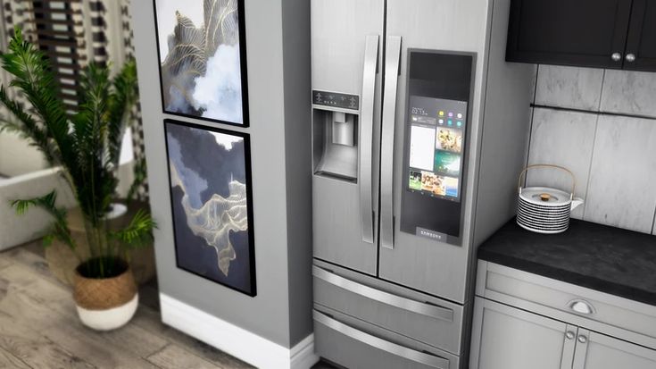 a modern kitchen with stainless steel appliances and black counter tops, along with potted plants