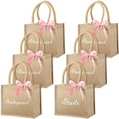 six bags with pink bows on them and the words bridesmaid written on them