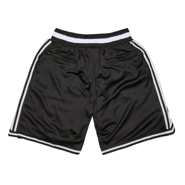 Combine your love of sports, streetwear and nostalgia by copping the Above The Rim Shootout Basketball Shorts. Featuring a mesh construction for a comfortable and customized fit. Contrast trims keep these shorts looking straight fire and make them a stand out, on and off the court. Cop yours today and roll with the pros!- Above The Rim Shootout Basketball Shorts- Ultra-Comfortable, Silky Smooth Inner Lining- Elasticated Waistband- 100% Mesh Fabric- Fully Embroidered Names and Numbers Breathable Black Shorts, Black Athletic Shorts For Training, Black Nylon Athletic Shorts With Elastic Waistband, Black Breathable Bottoms With Short Leg, Sports Athletic Shorts With Side Stripes, Black Nylon Athletic Shorts With Short Leg, Athletic Shorts With Side Stripes For Sports, Short Athletic Shorts With Side Stripes For Sports, Black Nylon Athletic Shorts