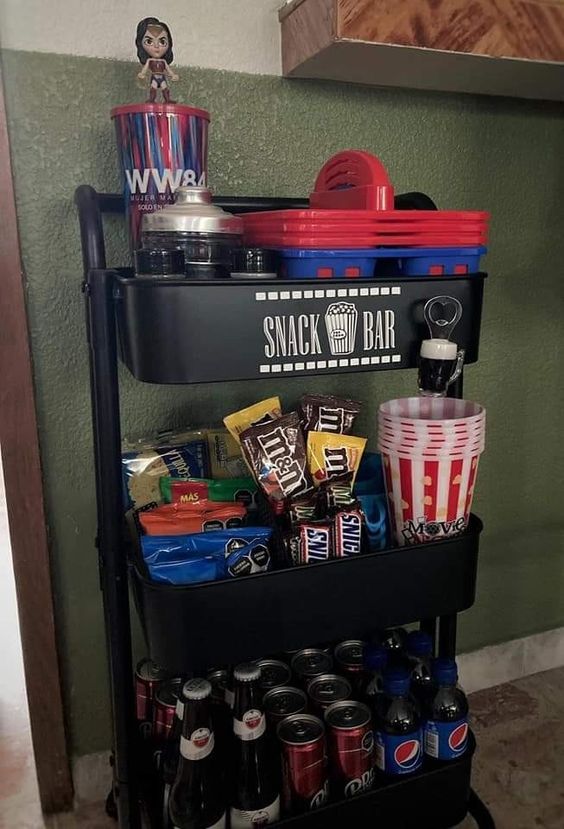 a snack bar cart filled with snacks and drinks