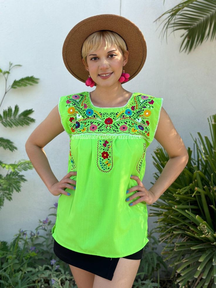 "Neon green Mexican blouse women, floral hand embroidery, fiesta mexicana outfit, Chartreuse top, boho hippie, cottagecore aesthetic, puebla  Elevate your fashion game with our striking Neon Green Mexican Blouse for women, a radiant fusion of tradition and contemporary style. This blouse is not just clothing; it's a vibrant cultural statement that will make you the life of any fiesta Mexicana. Adorned with intricate hand-embroidered floral patterns, this chartreuse top is a testament to the skilled artisans of Puebla. Each stitch is a work of art, preserving the rich heritage of Mexican craftsmanship. The neon green hue adds a pop of color, making it a standout piece in any setting. Whether you're embracing the boho hippie spirit, cultivating a cottagecore aesthetic, or simply looking for Green Bohemian Summer Blouse, Bohemian Green Summer Blouse, Green Bohemian Embroidered Top For Spring, Green Bohemian Peasant Top For Vacation, Green Bohemian Peasant Top For Beach, Green Bohemian Blouse For Summer, Green Summer Peasant Top For Beach, Bohemian Green Peasant Top For Beach, Green Bohemian Peasant Top For The Beach