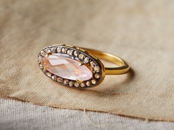 Lovely in pink and accented by single-cut diamonds, our Maren Ring is crafted with a faceted rose quartz center. Maren's sleek oval shape creates a splash of subtle sparkle that coordinates perfectly with your look, from daytime in the office to an evening out on the town. Oval Pink Jewelry With Single Cut Diamonds, Pink Oval Jewelry With Single Cut Diamonds, Oval Faceted Wedding Rings, Oval Rose Gold Rings With Single Cut Diamonds, Oval Rose Gold Ring With Single Cut Diamonds, Oval Rose Gold Rings With Single-cut Diamonds, Pink Oval Ring With Gemstone Accents, Pink Oval Rings With Rose Cut Diamonds, Oval Crystal Ring With Rose Cut Diamonds For Promise