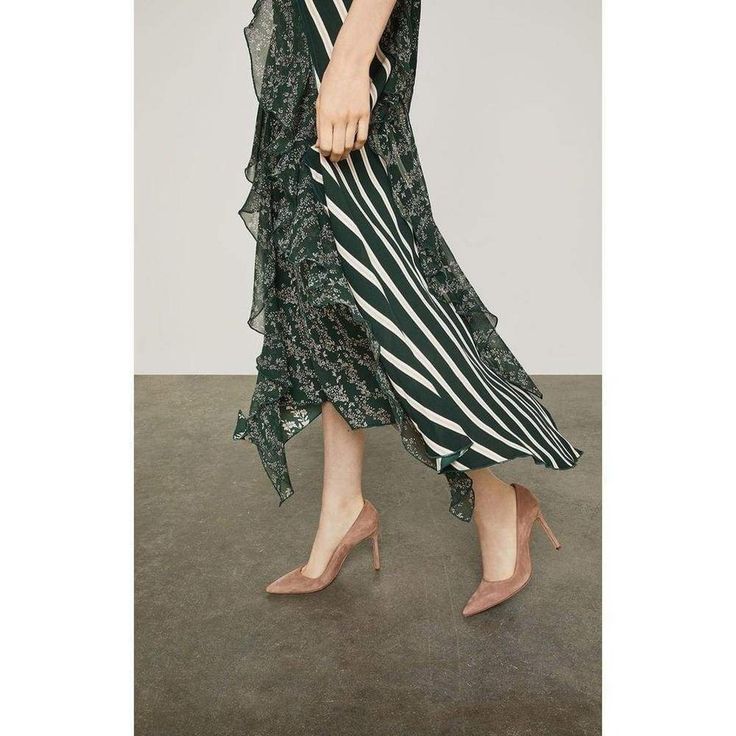 This sleeveless A-line dress in a romantic floral print is embellished with bold stripes, airy flounce, and a flowing asymmetrical hemline. “Stream of Bloom” print Fabric Self and Contrast 3: 100% polyester crepe; Contrast 1: 100% polyester floral georgette; Contrast 2: 100% polyester striped crepe; Lining: 100% polyester stretch crepe de chine Machine wash Imported Spring Elegant Midi Dress With Flared Hem, Elegant Spring Midi Dress With Flared Hem, Elegant Flared Hem Midi Dress For Spring, Chic Asymmetrical Midi Dress For Garden Party, Chic Dress With Flowy Asymmetrical Skirt, Chic Asymmetrical Dress With Floral Print For Spring, Elegant Asymmetrical Dress With Floral Print For Party, Elegant Dresses With Asymmetrical Hem And Flowy Skirt, Elegant Sleeveless Asymmetrical Dress With Floral Print