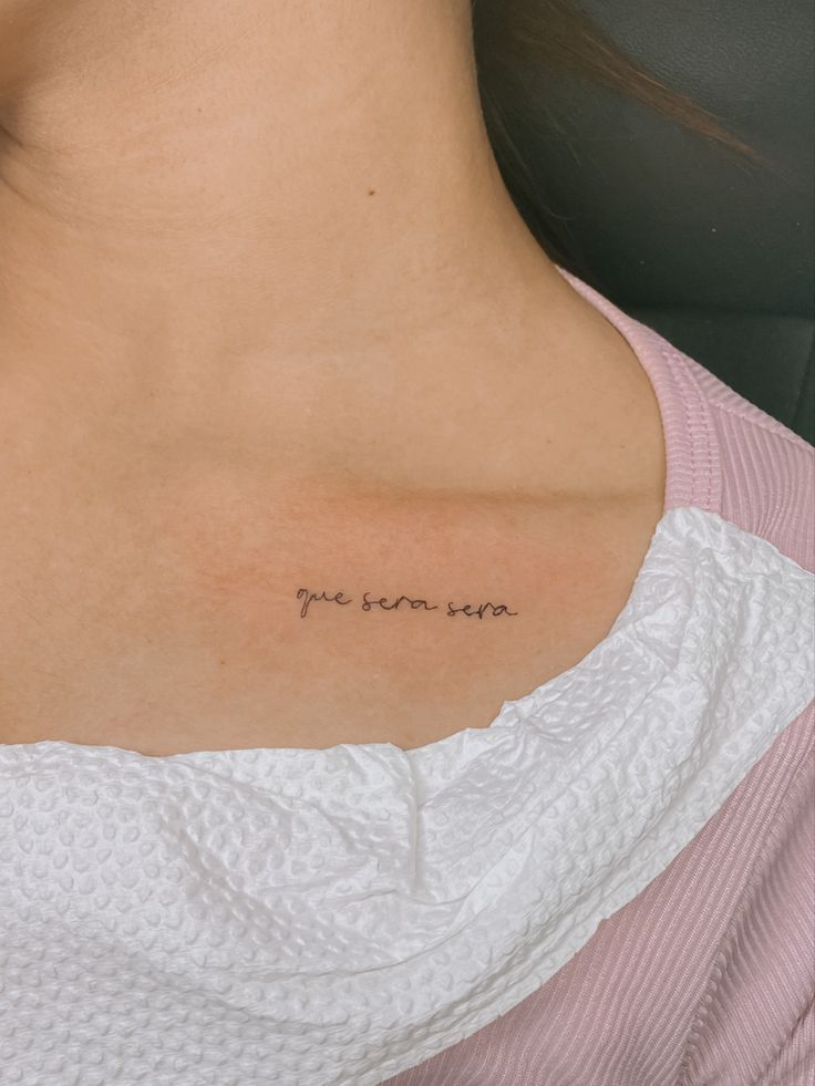 a woman's chest with the words you are not here written in cursive font