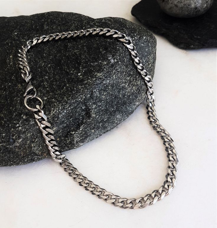 "Mens dark silver stainless steel cuban link chain necklace, sturdy curb chain necklace, unisex minimal style chain necklace, gift for him Welcome to my shop! ✈️ DHL EXPRESS SHIPPING AVAILABLE, 1-3 BUSINESS DAYS DELIVERY! ✔️ PLEASE MAKE SURE TO SELECT IT, RIGHT BEFORE YOUR PURCHASE! ❗️ ❗️ DON'T FORGET TO ADD YOUR CELL # AT THE \"NOTE TO SELLER\" SECTION IF YOU CHOOSE DHL! BY FILLING YOUR CELL NUMBER YOU EARN THE BENEFIT TO CHOOSE BETWEEN 6 DIFFERENT DELIVERY OPTIONS! INSTRUCTIONS WILL BE SENT TO Cuban Link Silver Chain Necklace, Minimalist Cuban Link Chain Jewelry, Silver Cuban Link Necklace For Everyday, Everyday Cuban Link Metal Necklace, Gunmetal Chain Link Jewelry, Silver Stainless Steel Cuban Link Necklace For Everyday, Minimalist Silver Cuban Link Necklace, Stainless Steel Chunky Chain Link Necklace, Minimalist Metal Necklaces With Curb Chain