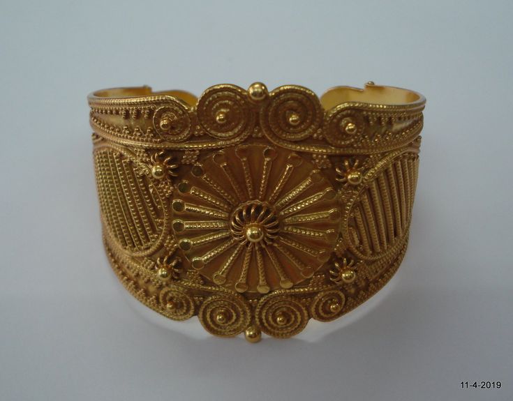 "sterling silver gold vermeil gold gilded Bangle Bracelet cuff from Rajasthan India. great handmade design good for jewelry collection. Note - Please check pictures carefully for more detail. Inner circumference - 15 cm (5.9\") width max.- 5 cm (1.96\") weight - 57.5 grams Material - sterling silver gold plate on top." Gold Bracelet With Decorative Band As Gift, Gold Bracelets With Decorative Band As Gift, Ceremonial Gold Brass Cuff Bracelet, Heirloom Yellow Gold Cuff Bracelet For Ceremonial Occasions, Ceremonial Heirloom Yellow Gold Cuff Bracelet, Gold Bracelet With Decorative Band For Anniversary, Handmade Gold Cuff Bracelet For Wedding, Unique Gold Bangle For Formal Occasions, Ceremonial Adjustable Gold Cuff Bracelet